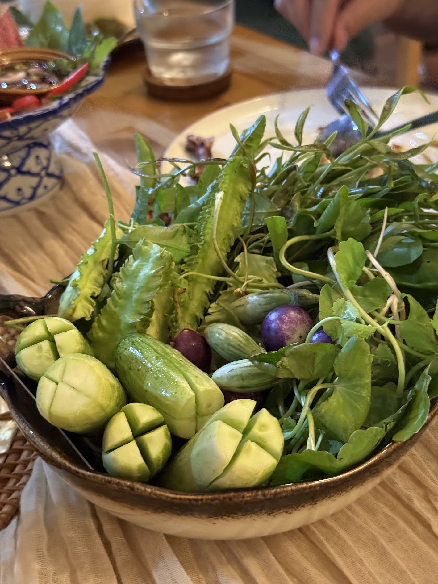 Fresh Thai herbs, vegetables and dipping sauce